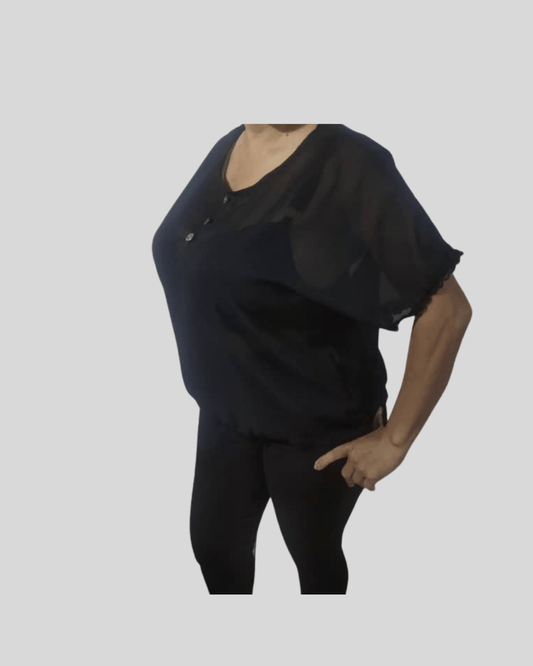 Blusa Negra de Transparencia Elegante
